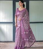Soft handloom linen saree with multicolor floral print and tassel edges