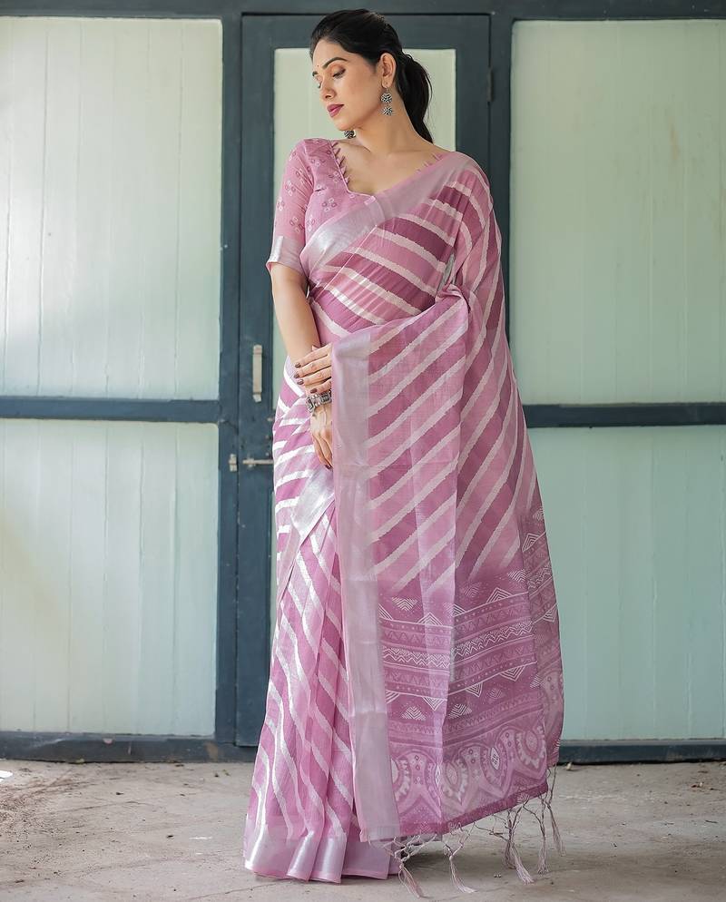 Elegant handloom linen saree with floral print & tassel edges     5.5m + 0.8m blouse