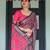 Traditional handloom linen floral saree with matching blouse & tassel detailing