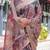 Linen handloom saree with digital floral print and tassels     festive wear