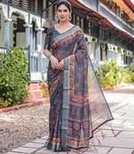 Pastel floral handloom linen saree with pallu tassels & blouse piece