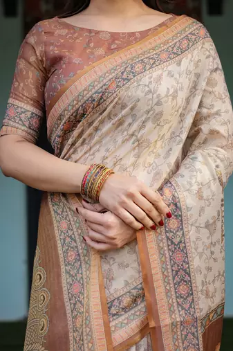 Cotton cotton blend handloom saree with floral motif and tassel border
