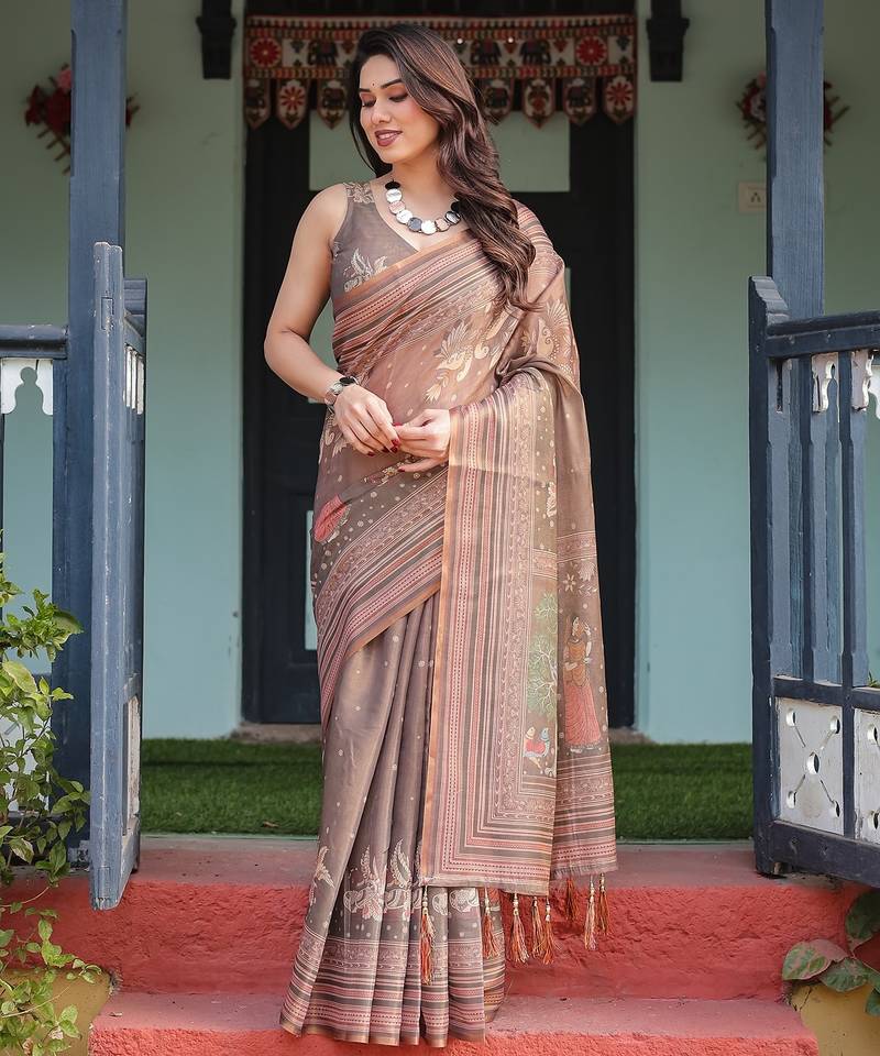 Handloom cotton floral printed saree with tassels & attached blouse     5.5m