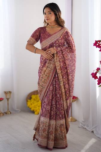 Cotton cotton blend handloom saree with floral motif and tassel border