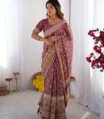 Cotton cotton blend handloom saree with floral motif and tassel border