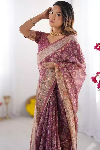 Cotton cotton blend handloom saree with floral motif and tassel border