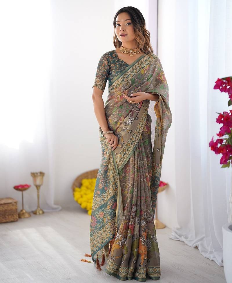 Handloom cotton floral printed saree with tassels & attached blouse     5.5m