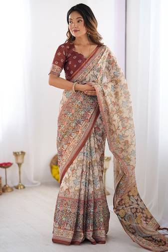 Traditional handloom cotton floral saree with matching blouse & tassel detailing