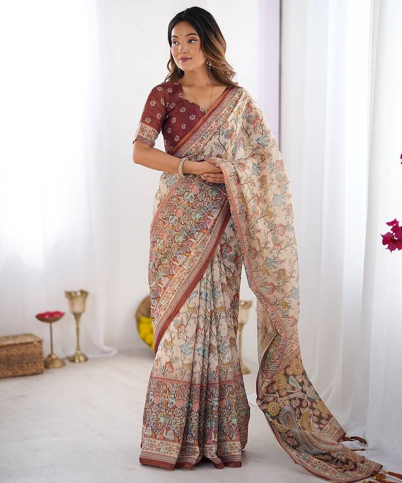 Traditional handloom cotton floral saree with matching blouse & tassel detailing