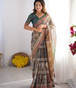 Cotton cotton blend handloom saree with floral motif and tassel border