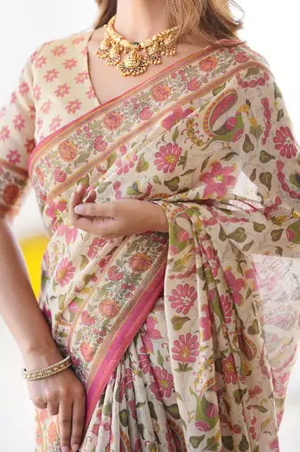 Handloom cotton floral printed saree with tassels & attached blouse     5.5m