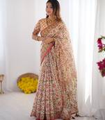 Handloom cotton floral printed saree with tassels & attached blouse     5.5m