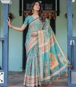 Traditional handloom cotton floral saree with matching blouse & tassel detailing