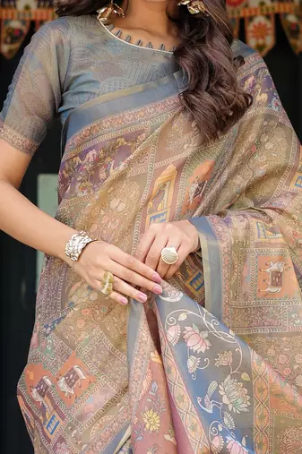Cotton cotton blend handloom saree with floral motif and tassel border