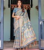 Handloom cotton floral printed saree with tassels & attached blouse     5.5m
