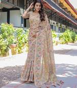 Cotton cotton blend handloom saree with floral motif and tassel border