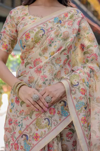 Cotton cotton blend handloom saree with floral motif and tassel border