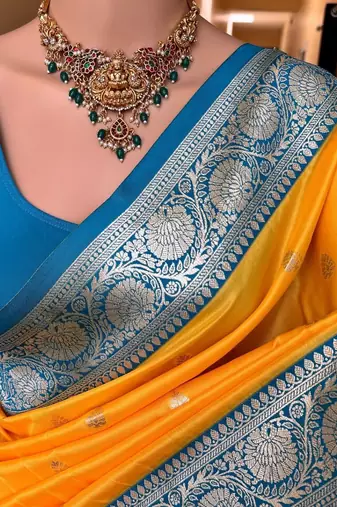 Yellow soft silk blend saree with zari weaving meenakari design