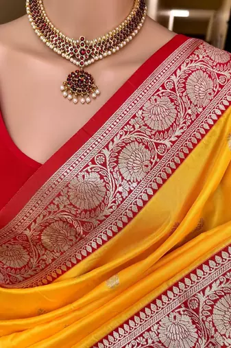 Yellow soft silk blend saree with zari weaving meenakari design