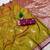 Olive green soft silk blend saree with zari weaving meenakari design
