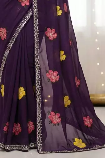 Purple star georgette floral motifs embroidered work saree with mirror work border
