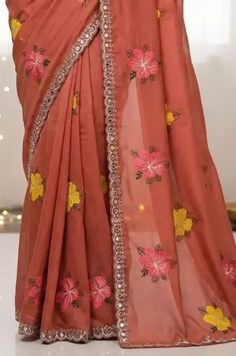 Red star georgette floral motifs embroidered work saree with mirror work border