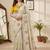 Off white star georgette floral motifs embroidered work saree with mirror work border
