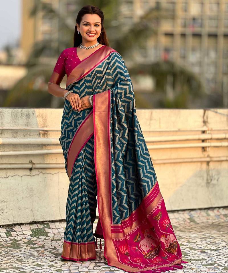 Teal contrast woven ikat pattern with zari pallu work silk blend  