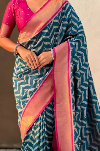 Teal contrast woven ikat pattern with zari pallu work silk blend  
