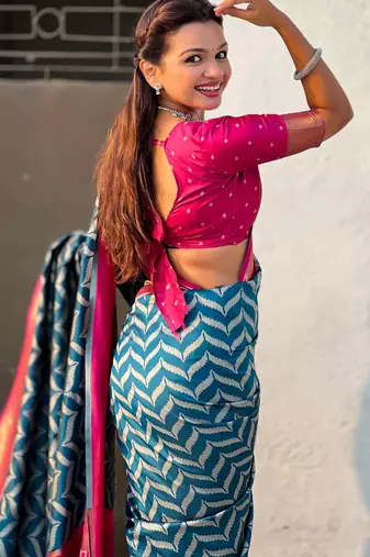 Teal contrast woven ikat pattern with zari pallu work silk blend  