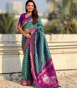 Green contrast woven ikat patgrrn with zari pallu work silk blend  