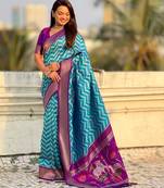 Blue contrast woven ikat patblrn with zari pallu work silk blend  