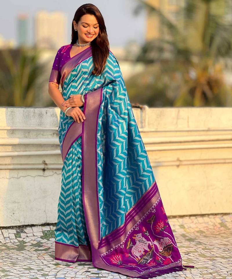 Blue contrast woven ikat patblrn with zari pallu work silk blend  