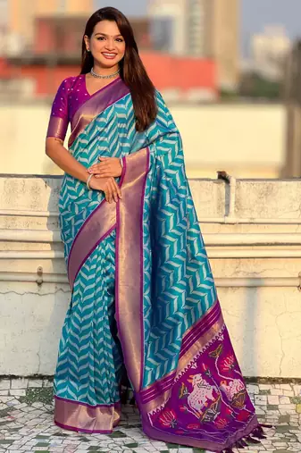 Blue contrast woven ikat patblrn with zari pallu work silk blend  
