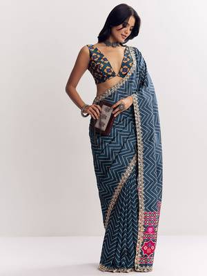 Teal blue manipuri zigzag pattern leheriya printed saree with embroidery work lace 2
