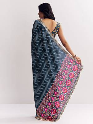 Teal blue manipuri zigzag pattern leheriya printed saree with embroidery work lace 3