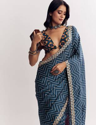 Teal blue manipuri zigzag pattern leheriya printed saree with embroidery work lace 4