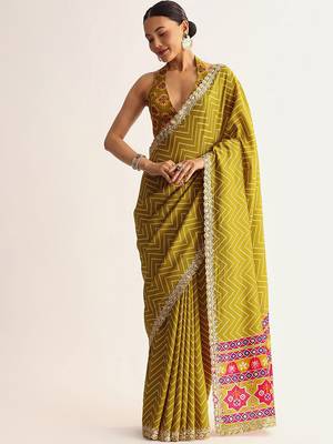 Mehendi green manipuri zigzag pattern leheriya printed saree with embroidery work lace 1
