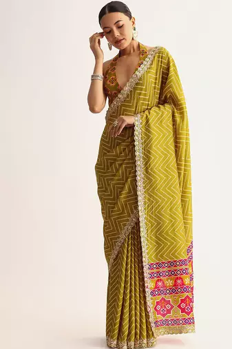 Mehendi green manipuri zigzag pattern leheriya printed saree with embroidery work lace