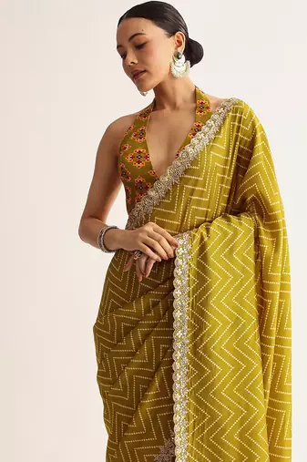 Mehendi green manipuri zigzag pattern leheriya printed saree with embroidery work lace