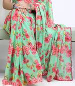 Pista color  all over floral printed with premium lace border weightless saree with unstitched blouse