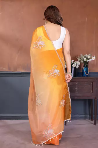 Orange & yellow gold crush multicolored floral motifs embroidery saree