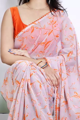 Orange color  all over floral printed with premium lace border weightless saree with unstitched blouse