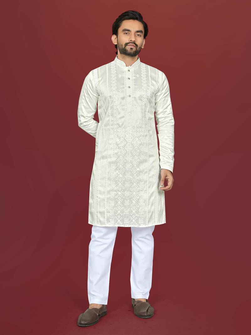 white embroidered silk kurta pyjama set with silver sequin work