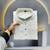 white embroidered silk kurta pyjama set with silver sequin work