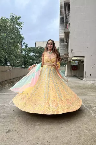 Yellow Dola Silk Lehenga Choli with Multi Color Thread & Sequin Embroidery Work