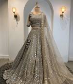 Grey Faux Georgette Lehenga Choli with Paper Mirror & Zari Embroidery Work and Net Dupatta