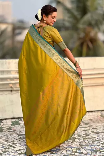 Antique gold contrast woven zari floral border & pallu work  silk blend  