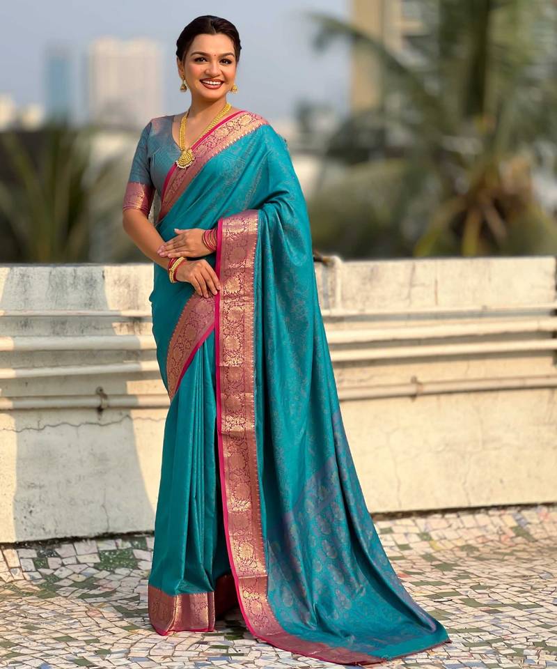 Teal contrast woven zari floral border & pallu work  silk blend  