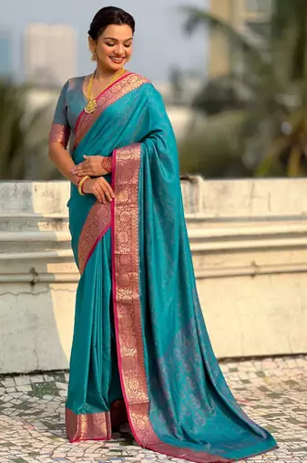 Teal contrast woven zari floral border & pallu work  silk blend  